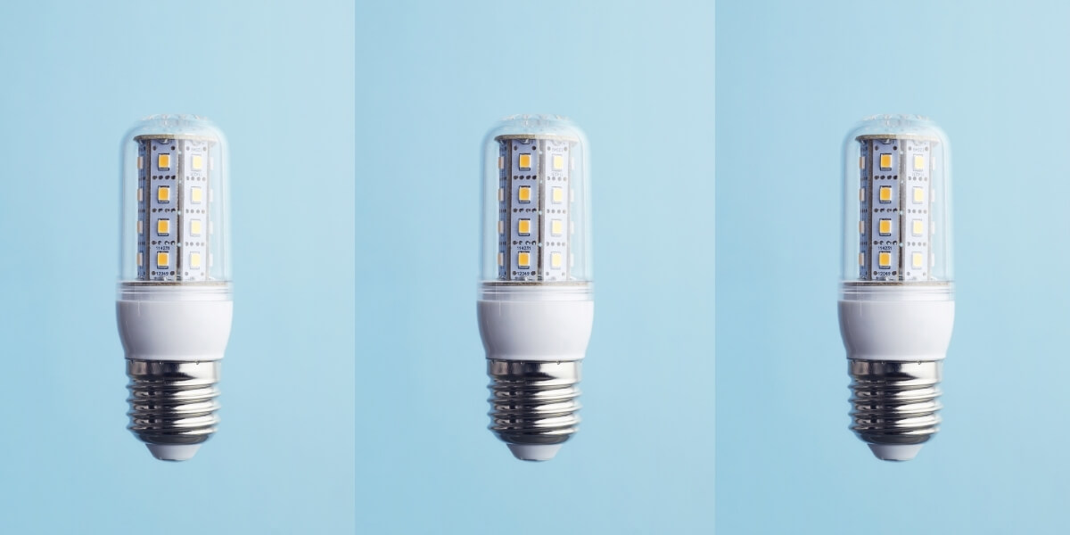 LED light bulb on pale blue background