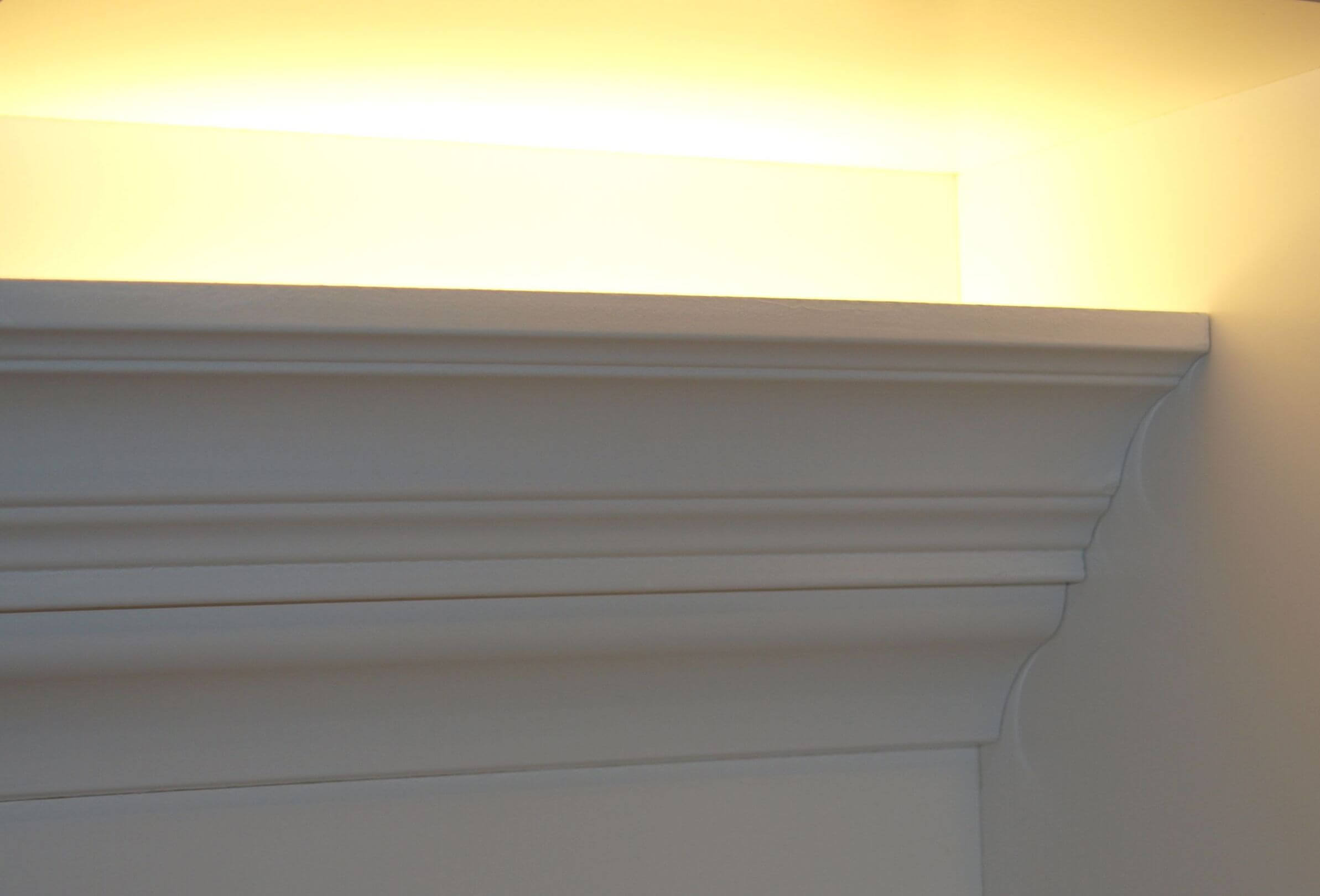 Bulkhead and crown molding cove lighting installation