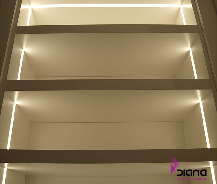 Millwork cabinet with linear LED lighting detail