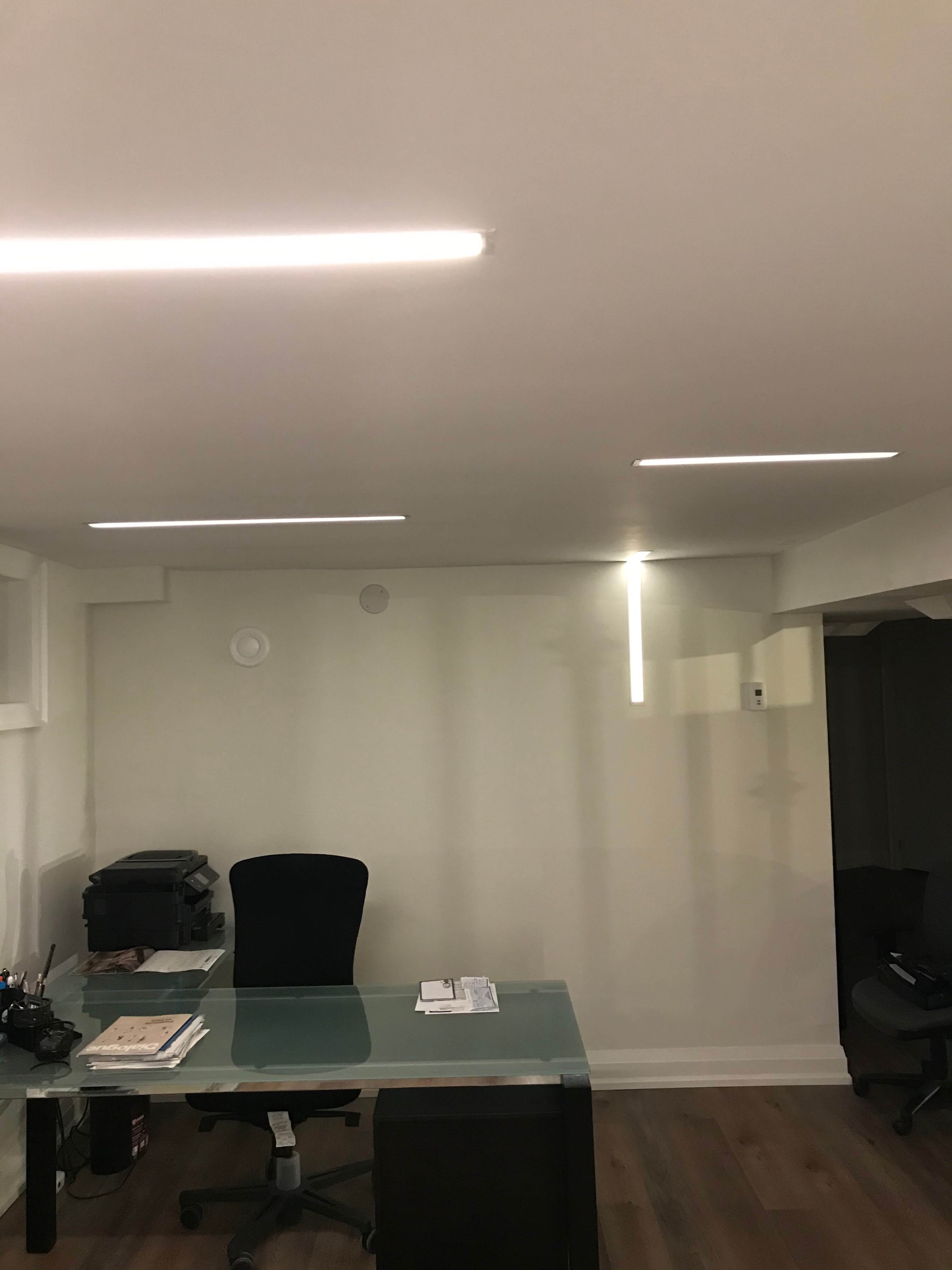 Basement recessed linear LED lighting installation