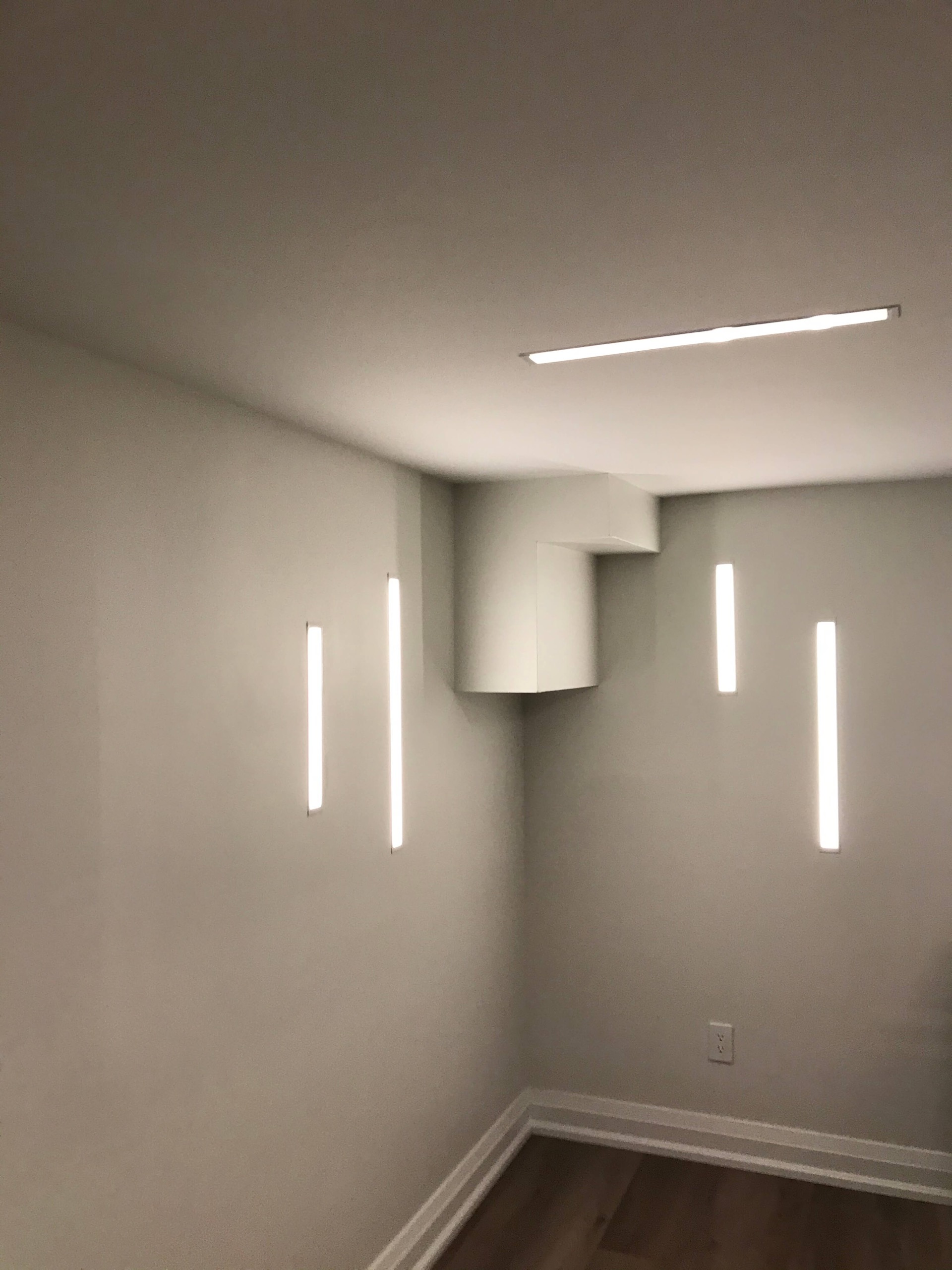 Recessed linear lighting in a modern interior design