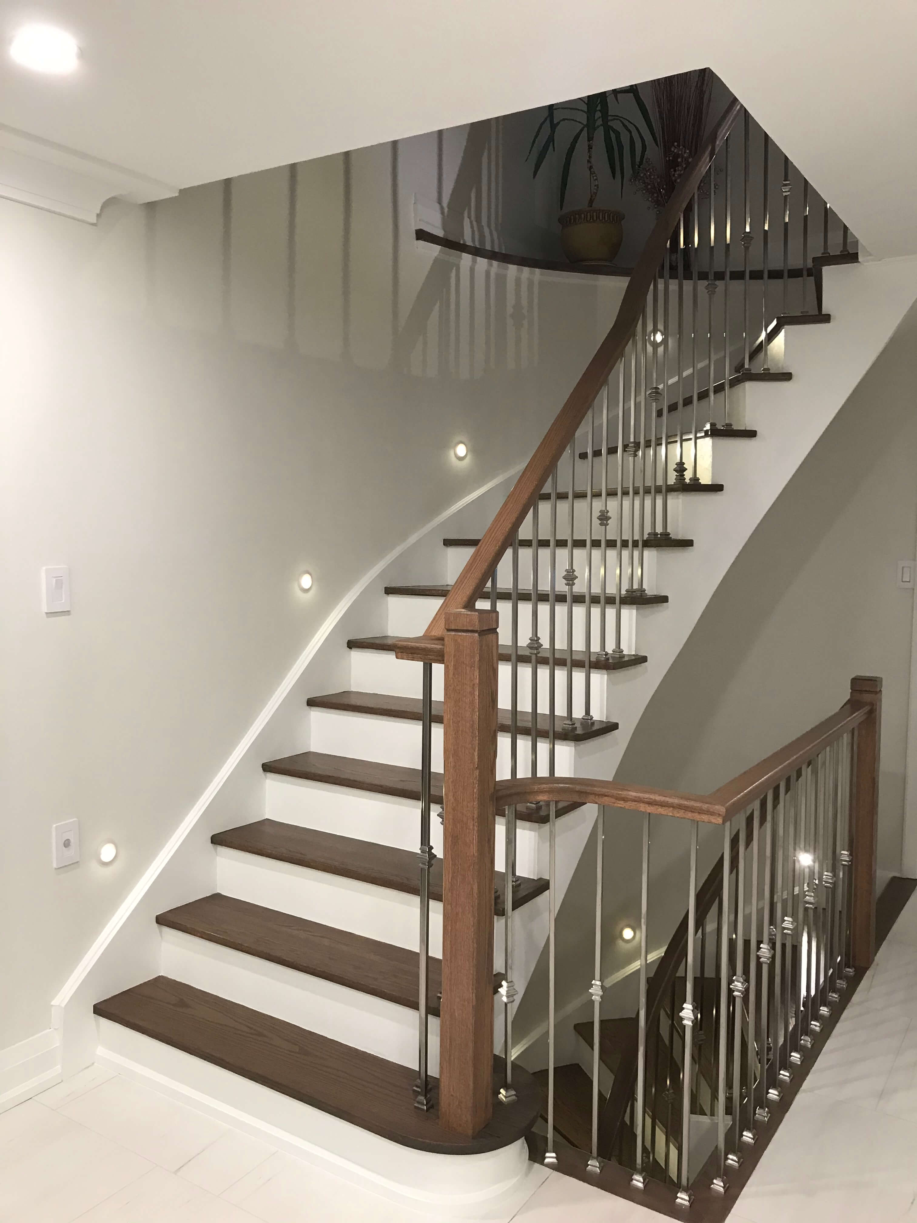 Wall-recessed stair lighting on a residential staircase