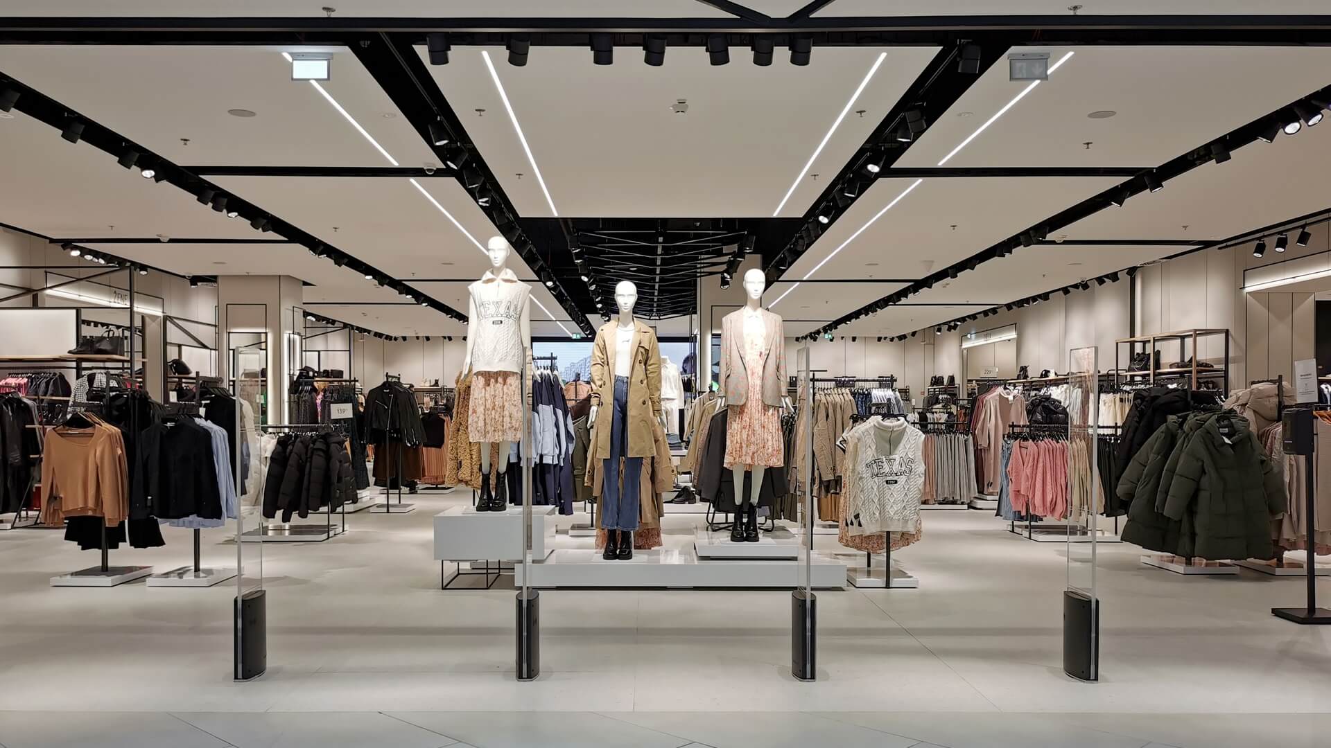 Shop entrance of an empty clothing store in mall for Diana Lighting